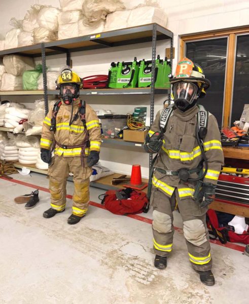 Brady Parsons, of Bristol (left), and Nick Meiggs, of Nobleboro, try on firefighting gear during a basic fire class on Monday, March 2. The class is run by the Lincoln County Fire Association and is designed to meet minimum standards for interior firefighter certification. (Courtesy photo)