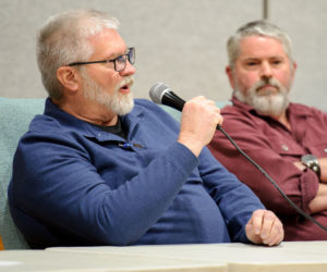 Adjunct Facilities Director John Carroll (left) addresses Nobleboro residents as Nobleboro Central School Committee Chair Matt Benner listens during a special meeting at the school on Saturday, March 21. Carroll detailed the work required to ensure the affected section of the school where high levels of mold were found is safe for students. (Bisi Cameron Yee photo)