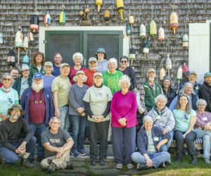 The Friends of Hog Island's volunteer crew gathers for a group picture during Hog Island Audubon Camp's opening week in 2025. (Courtesy photo)