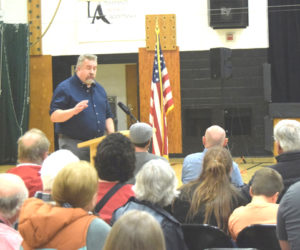 Damariscotta attorney Peter Drum addresses a Newcastle town meeting in May 2024. On March 24, the Maine Law Court temporarily suspended Drum from practicing law, ruling evidence supports a finding of multiple violations of the Maine Rules for Professional Conduct. (LCN/file photo)