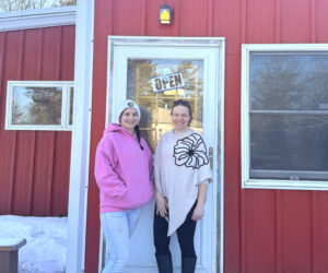 The new owner of Haggett Hill Kennel Sallie Albert (right) stands beside longtime employee Devin Jones outside of the Edgecomb kennel. Albert has started a program called New Leash on Life Recovery and Rescue which aims to house pets from people who face homelessness, need mental health and substance use treatment, and or are in a domestic violence situation. The program will also feature a recovery house for recently incarcerated women with substance use disorders to help them get back on their feet. (Christina Wallace photo)
