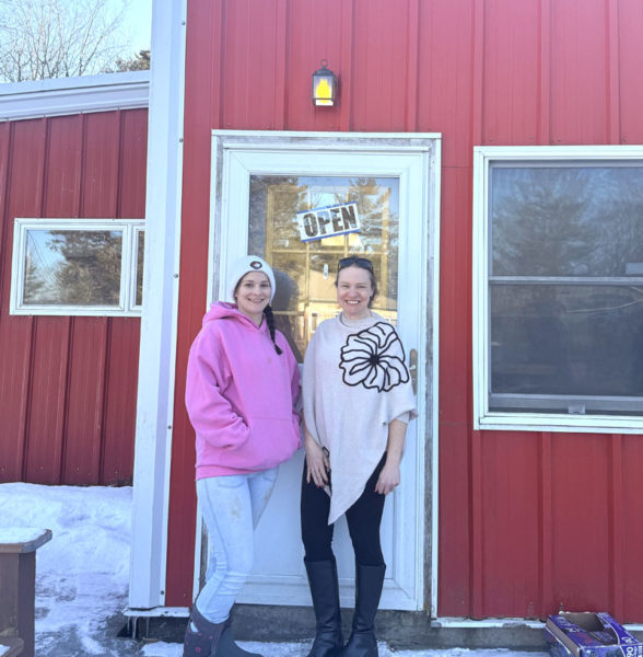 The new owner of Haggett Hill Kennel Sallie Albert (right) stands beside longtime employee Devin Jones outside of the Edgecomb kennel. Albert has started a program called New Leash on Life Recovery and Rescue which aims to house pets from people who face homelessness, need mental health and substance use treatment, and or are in a domestic violence situation. The program will also feature a recovery house for recently incarcerated women with substance use disorders to help them get back on their feet. (Christina Wallace photo)