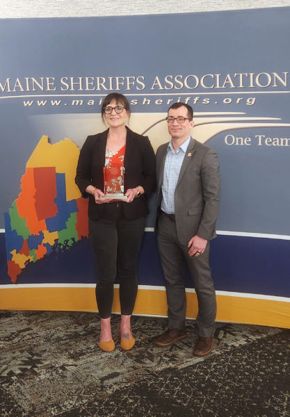 Hannah Meneses smiles after receiving the Maine Sheriffs Association Presidential Valor Award at the Maine Sheriffs spring conference on April 9. In March 2025, Meneses and Cameron Ryan saved a man out of his sinking car in Jefferson. (Photo courtesy of Rand Maker).
