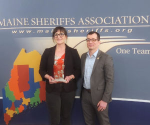 Hannah Meneses smiles after receiving the Maine Sheriffs Association Presidential Valor Award at the Maine Sheriffs spring conference on April 9. In March 2025, Meneses and Cameron Ryan saved a man out of his sinking car in Jefferson. (Photo courtesy of Rand Maker).