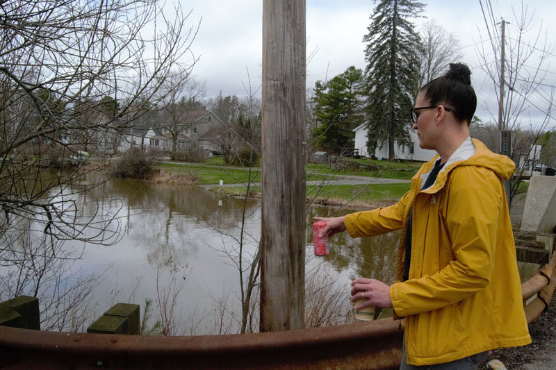 Hannah Meneses points to where she jumped into Davis Stream in Jefferson in March 2025 to save a man from his sinking car. Meneses and Cameron Ryan, who assisted Meneses, was awarded with the Maine Sheriffs Association Presidential Valor Award on April 9 at the Maine Sheriffs Association spring conference. (Emily Bracher photo).