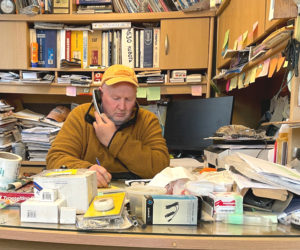 Mike Nyboe works in his office at Bittersweet Landing in South Bristol. Nyboe credits his wife, Charlotte, for doing the heavy lifting behind the scenes while he gets to be the public face of the business. "Without her, I would be lost," he said. (Sherwood Olin photo)