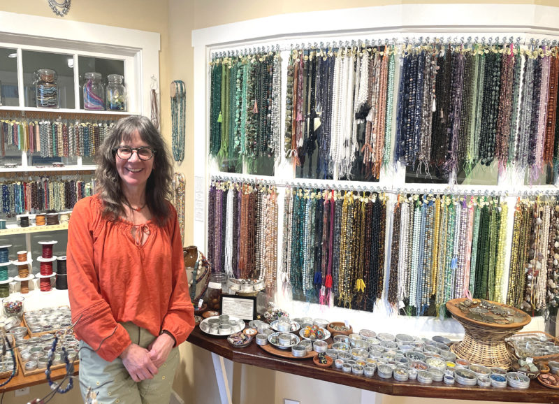 Aboca Beads and Jewelry owner Judy Dumont stands in her Damariscotta store. A landmark business for beading enthusiasts, Aboca Beads offers classes in jewelry making and design. Meeting with a people or small group and designing an experience just for them is always a pleasure, Dumont said. (Sherwood Olin photo)