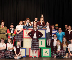 The cast of "Matilda: The Musical" features Annalise Gapski as Matilda Wormwood, Joseph Lugosch as Miss Agatha Trunchbull, and Isabella Dyke as Miss Honey. The production opens for three performances at Wiscasset Middle High School on Friday, April 17. (Photo courtesy Wiscasset Schools)