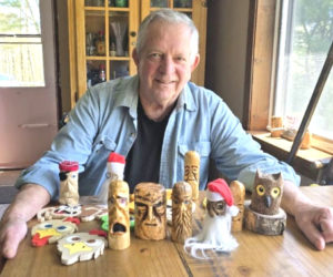 Jan Griesenbrock displays his some of the wood carvings - or "little critters," as he called them - at his home in Waldoboro. Wood carving is Griesenbrock's latest creative project in his retirement. (Christine Simmonds photo)