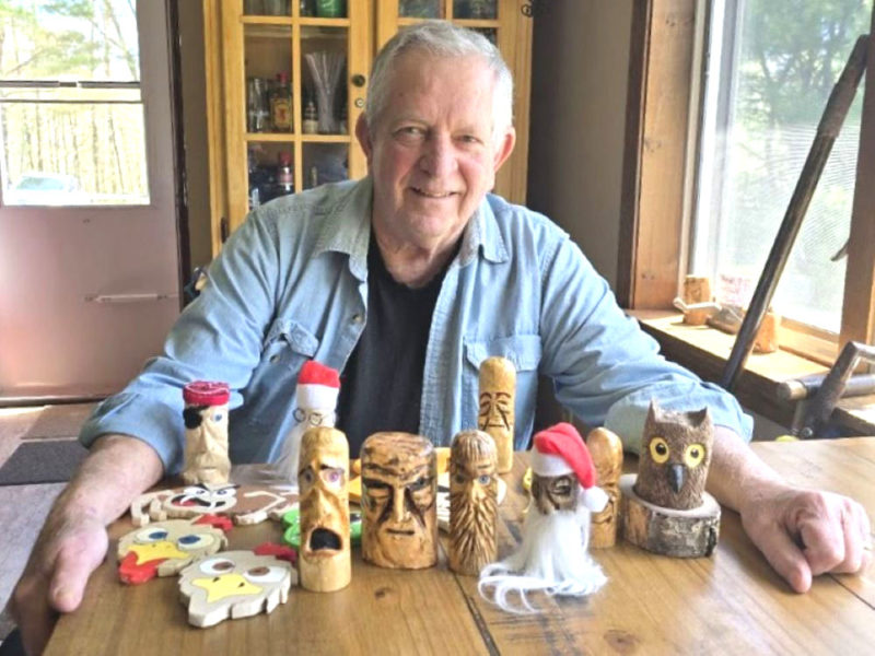 Jan Griesenbrock displays his some of the wood carvings - or "little critters," as he called them - at his home in Waldoboro. Wood carving is Griesenbrock's latest creative project in his retirement. (Christine Simmonds photo)