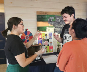 Attendees try a variety of packaged edible insect products from Entosense and participate in insect trivia at the 2025 Sustainable Supper with Edible Insects event. (Courtesy photo)