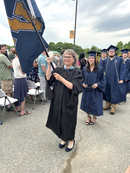Medomak Valley High School Principal Linda Pease leads the class of 2026 out of the parking lot at the end of the graduation ceremony on Wednesday, June 10. The ceremony was Pease's final as principal. She has worked at MVHS since 2005. (Photo courtesy Lisa Genther Gunn)