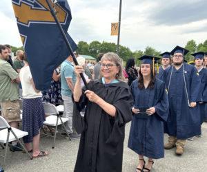 Medomak Valley High School Principal Linda Pease leads the class of 2026 out of the parking lot at the end of the graduation ceremony on Wednesday, June 10. The ceremony was Pease's final as principal. She has worked at MVHS since 2005. (Photo courtesy Lisa Genther Gunn)