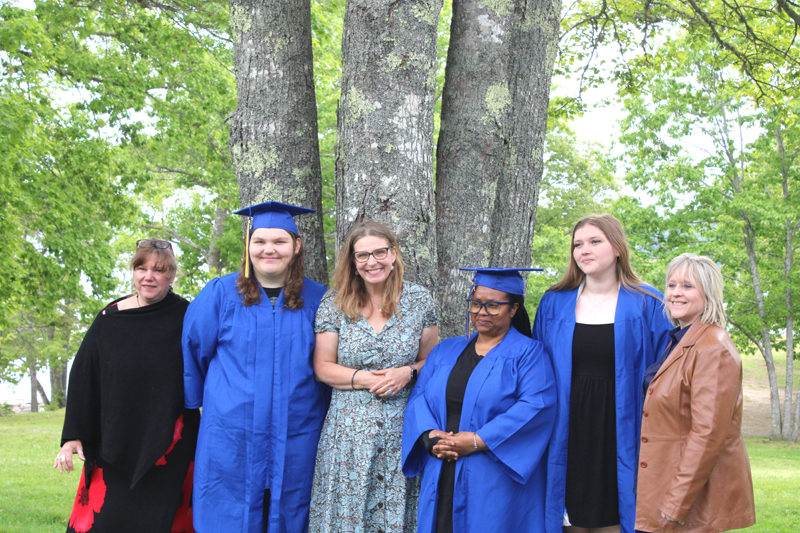 Boothbay-Wiscasset Regional Adult Education graduates Nevaeh Morin, Camla Dunbar, and Allyson Warren, celebrate with instructors Tanya Thibault and Margit Ahlin and Director Raye Leonard on Saturday, June 6. From left: Tanya Thibault, Nevaeh Morin, Raye Leonard, Camla Dunbar, Allyson Warren, and Margit Ahlin. Not pictured: Graduate Anina Halter. (Photo courtesy Rachelle Leonard)