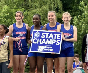 Boothbay-Wiscasset's Rose Campbell, Nerla Laventure, Moriah Smith, and Olivia Rittall celebrate after winning the girls 4x100 at the Class C state track championship on Saturday, June 6. (Courtesy photo)