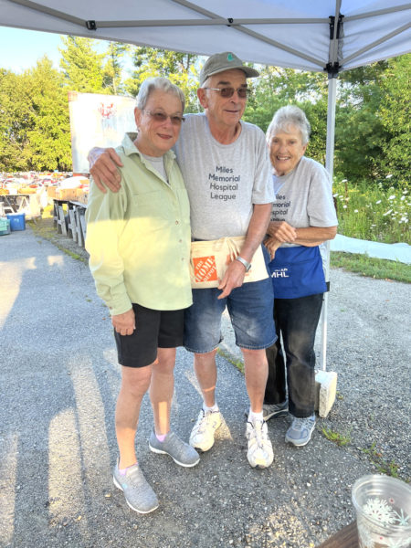 Miles Memorial Hospital Rummage Sale volunteers Paula and Bob Wheeler and Nancy Holmes Bailey pose for a photo. (Photo courtesy Miles Memorial Thrift Shop)
