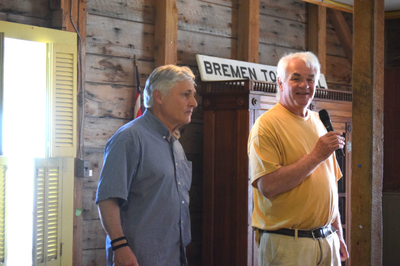 Bremen Select Board members John "Boe" Marsh (right) and Tom Papell recall stories about outgoing board member Wendy Pieh during her retirement party on Sunday, June 28. (Morgan VanNosdall photo)