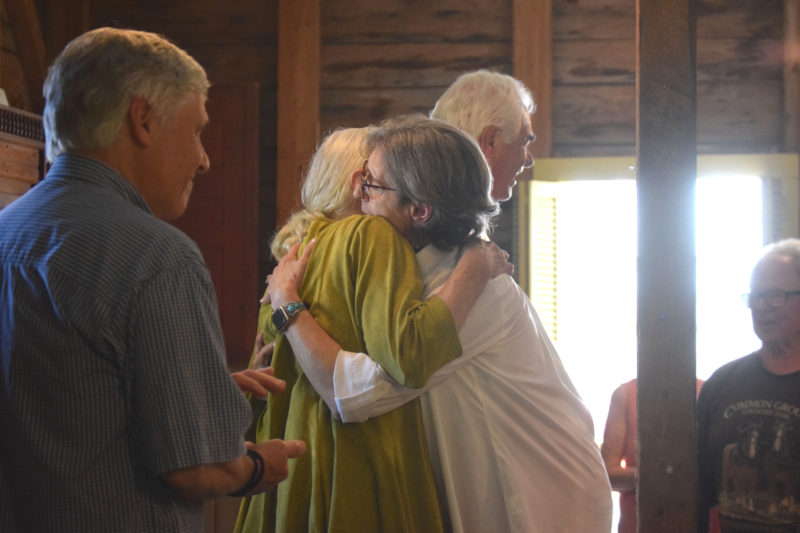 Outgoing Bremen Select Board member Wendy Pieh and Debora Elliott embrace at Pieh's retirement party on Sunday, June 28. (Morgan VanNosdall photo)