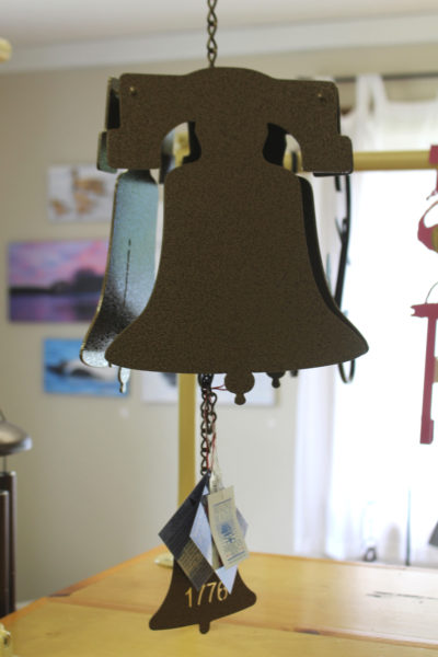 The liberty bell made by North Country Wind Bells to celebrate Americas 250th birthday. Each bell is made of laser-cut steel and coated with powder that gives it its color and weather resistance. (Amelia Rice photo)