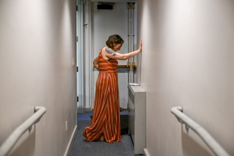 Laetitia Brundage reviews her notes just before her live storytelling performance at The Waldo Theatre in Waldoboro on June 12. Brundage used song to access emotions that arose after her mothers dementia diagnosis. (Bisi Cameron Yee photo)