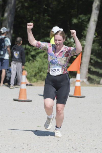 A triathlete celebrates after completing the 2025 Pemaquid Beach Triathlon. (Photo courtesy Bob Kofman)